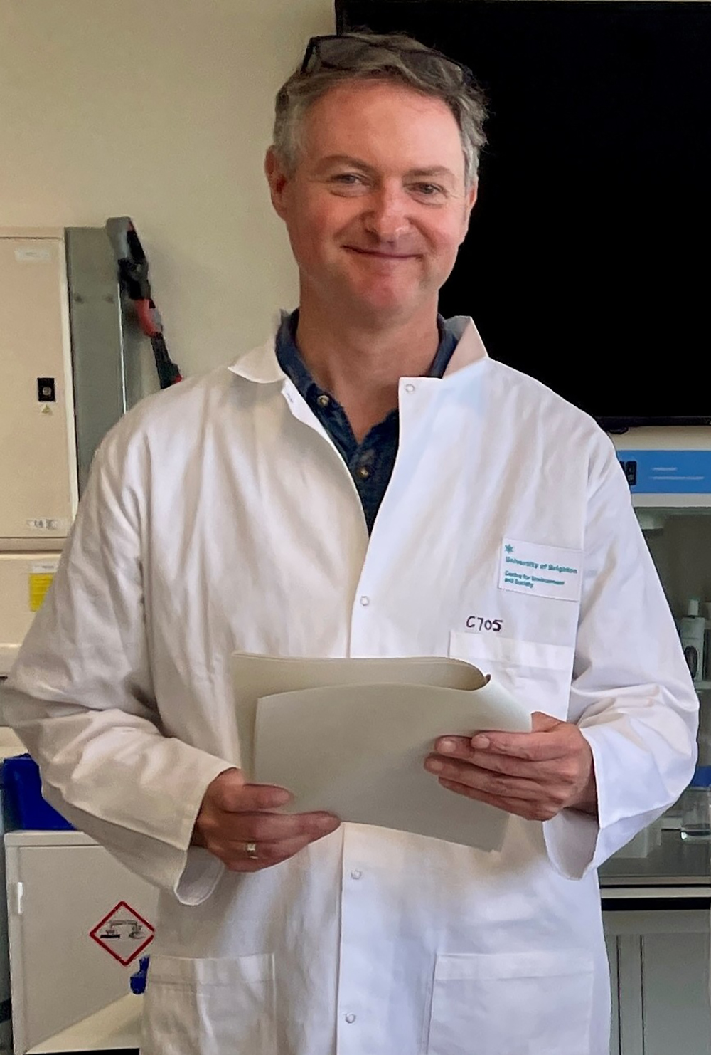 James Ebdon in a lab coat