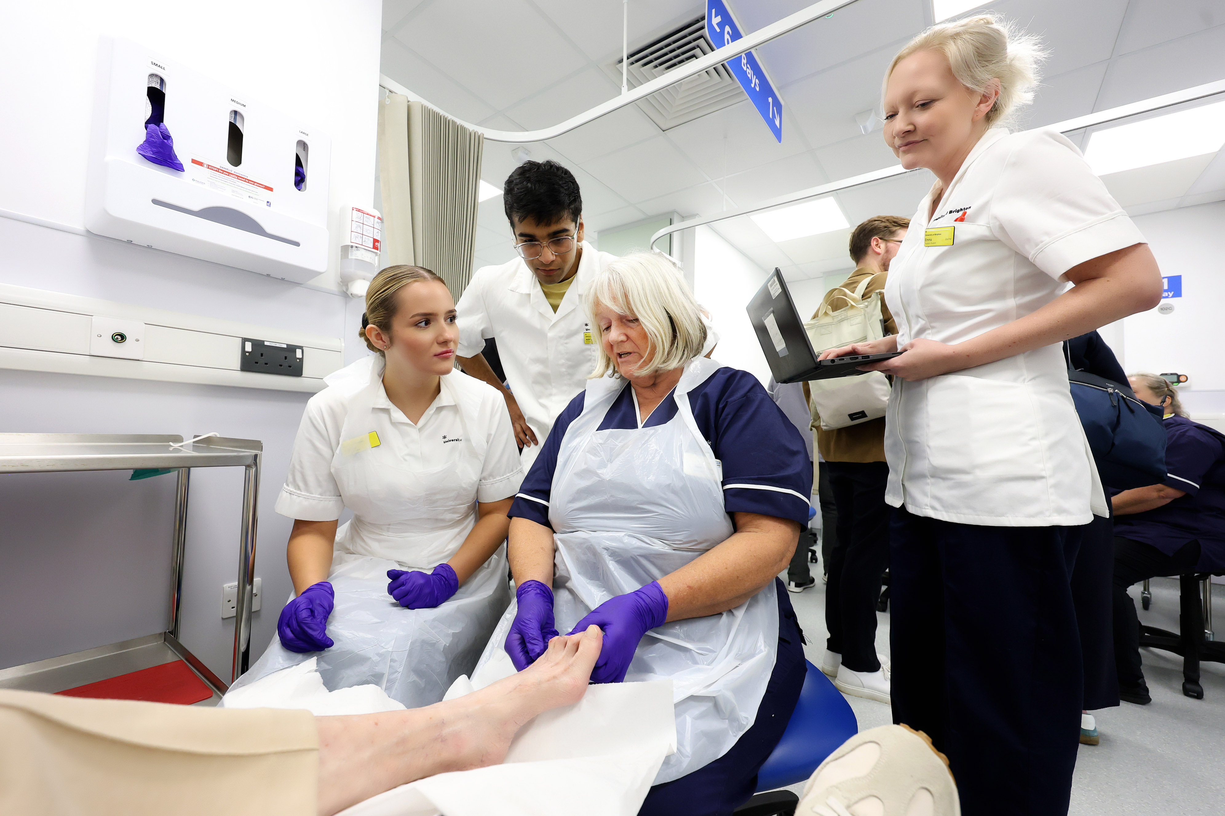 Podiatrists and UoB students in action at the podiatry clinic