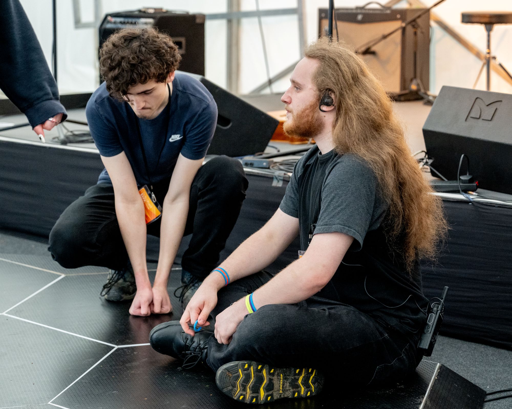 Two people sit on a haptic dancefloor