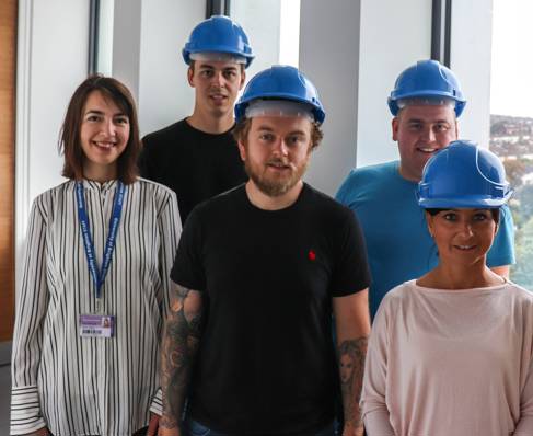 Civil engineering course leader Maria Diakoumi with four Civil Engineering apprentices