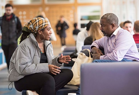 Students talking in a social area