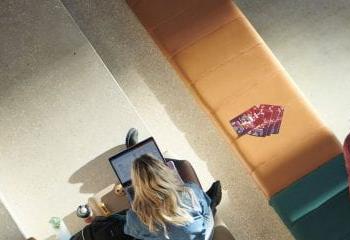 Business students chatting on stairs