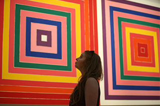 A student in an art gallery
