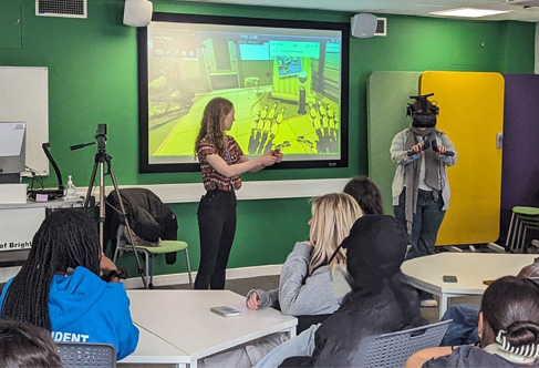 A student using a VR headset in a classroom