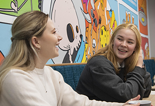 Two students in the SU bar