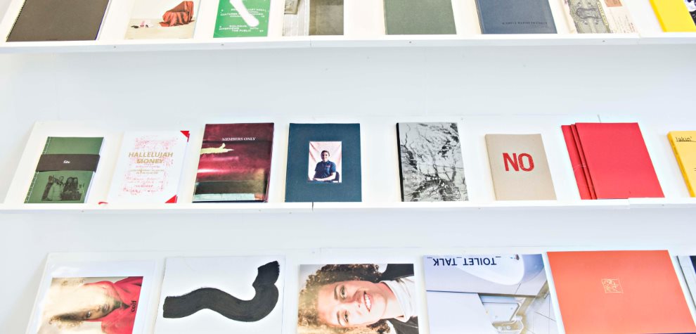 Graphic design publications on shelves