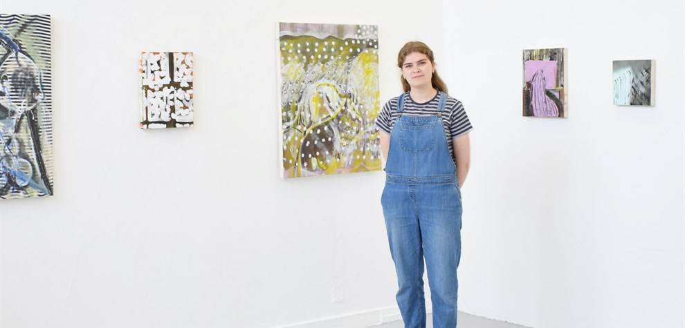 Lydia Stonehouse, Fine Art Painting 2022 graduate, with her work