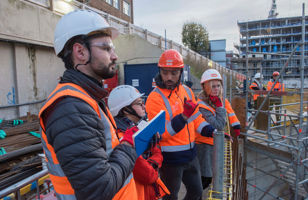 Students on Big Build site in high vis jackets
