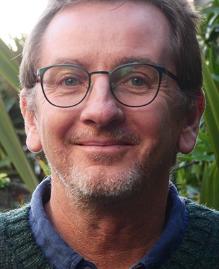 Head and shoulders portrait of Professor Mark Devenney, political philosopher and professor of critical thinking, University of Brighton