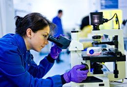 Student with microscope