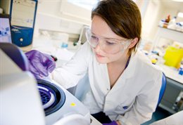 Science student in a white coat