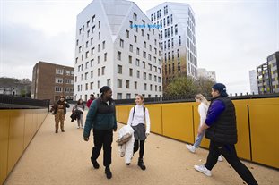 Students crossing the bridge at Moulsecoomb halls