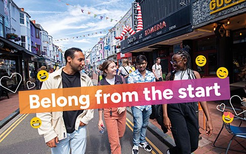 Four students walking along the Kensington Gardens area of Brighton, with the text 'Belong from the start' overlaid and happy emojis and heart shapes