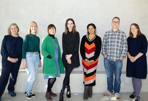 A group of people standing in a line