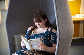 A student reading a book