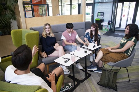 Students socialising in the Checkland building